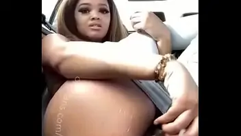 Black girl playing with pussy in car